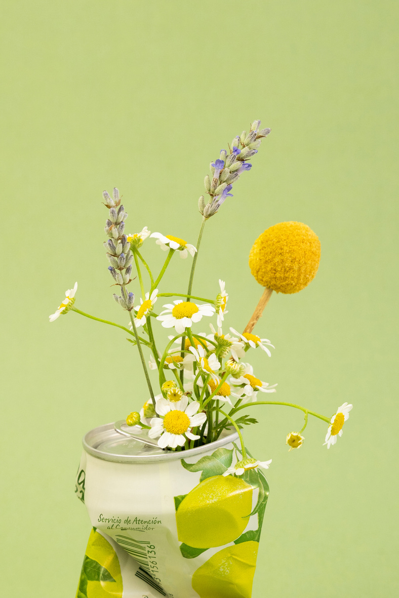 Flowers in Used Tin Can